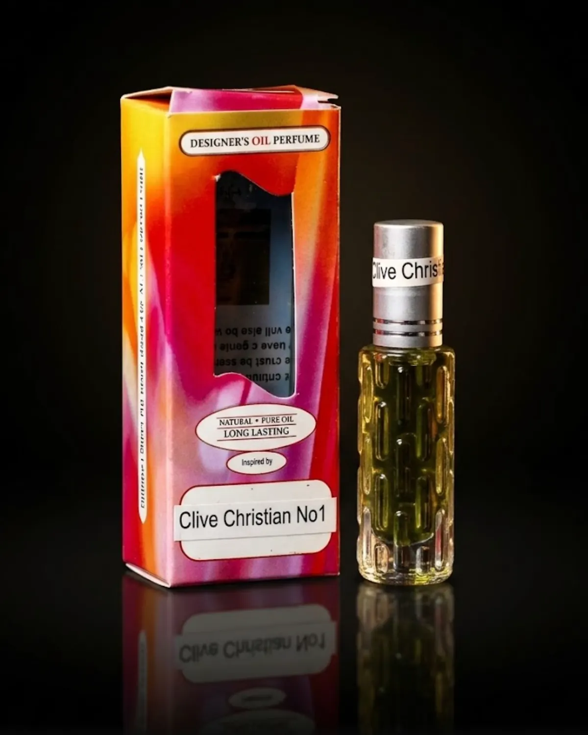 A 10 ml roller bottle of perfume oil beside its printed Designer's Oil Perfume box